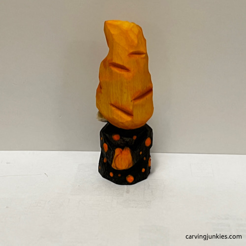 Back of painted Halloween gnome carving