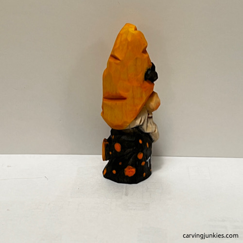 Right view of painted Halloween gnome carving
