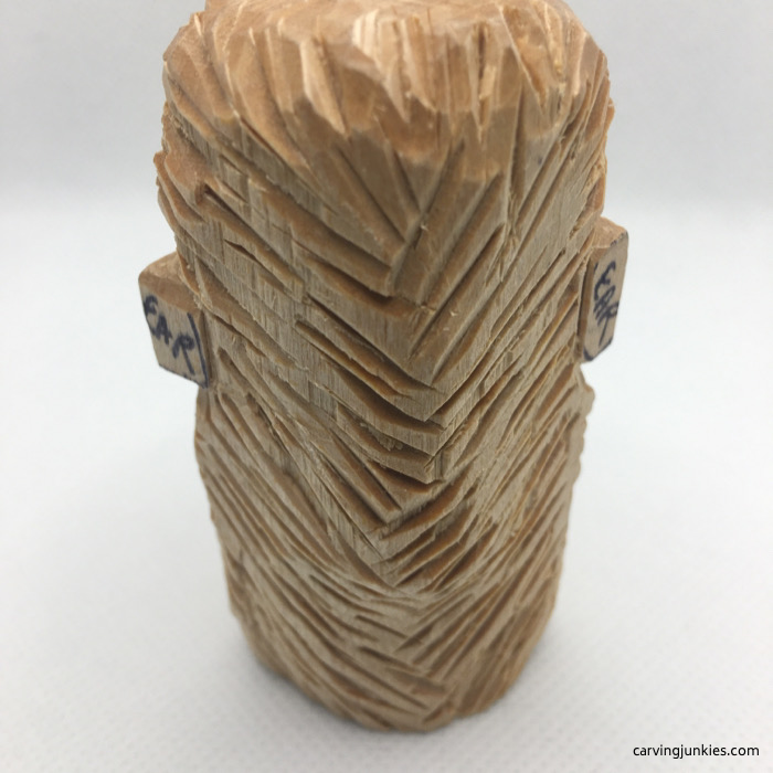 Angled cuts on back of wood carved hedgehog