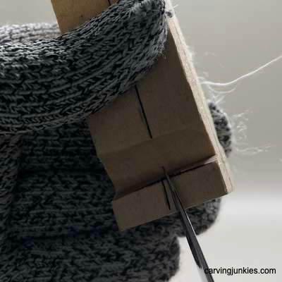 Notching feet on hillbilly carving