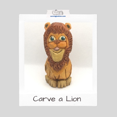 Cute lion wood carving with big eyes