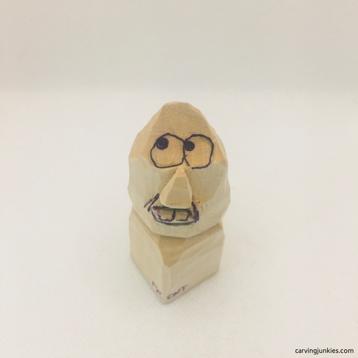 Mouth is drawn on wood