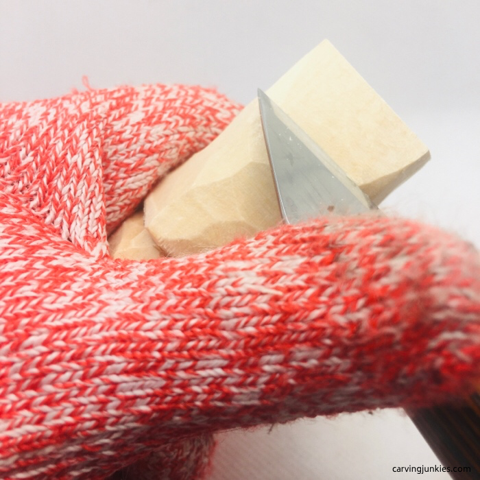 Shaving wood with a knife