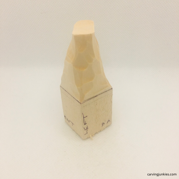 Left side of wood carving in progress