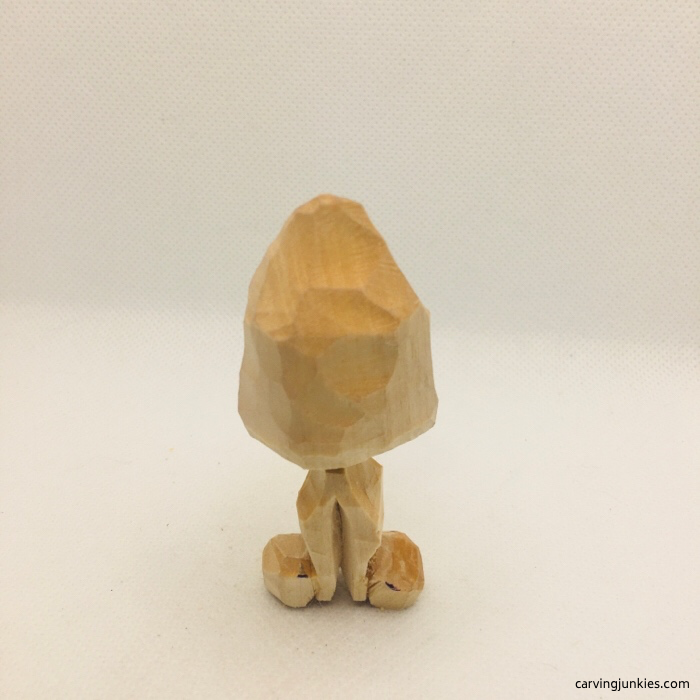 Back view of candy corn wood carving