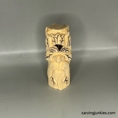 Leaf details are added to wooden green man