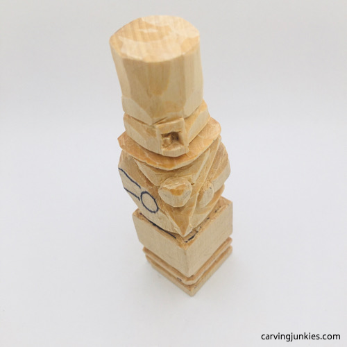 Finished arm on leprechaun wood carving