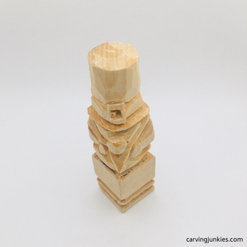 Front details of leprechaun wood carving