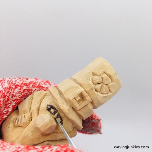 Wood carving leprechaun eyes