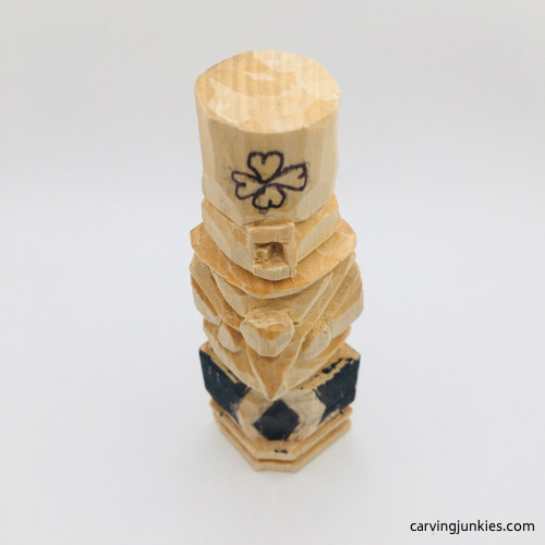 Marking legs on wooden leprechaun