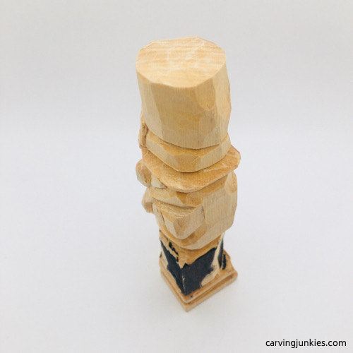 Left view of marked wood on leprechaun