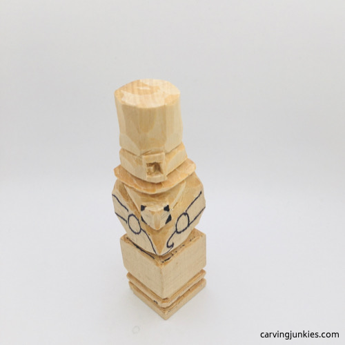 Rounding nose on leprechaun wood carving