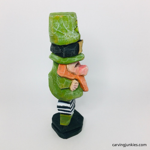 Right side of painted wooden leprechaun