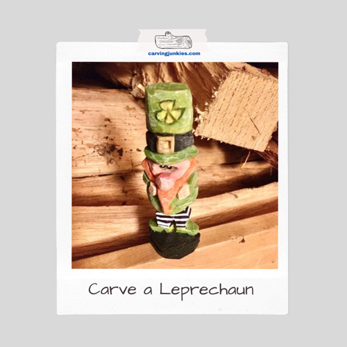 Cute and colorful leprechaun wood carving with striped leggings