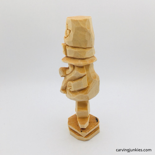 Left side of unfinished leprechaun wood carving