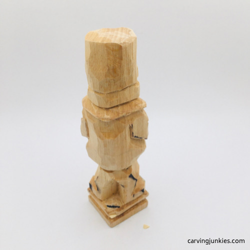 Carved legs on leprechaun carving