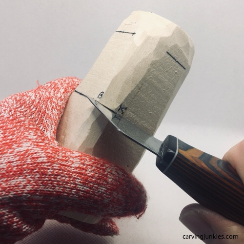 Stop cut to separate the bottom of the lion head