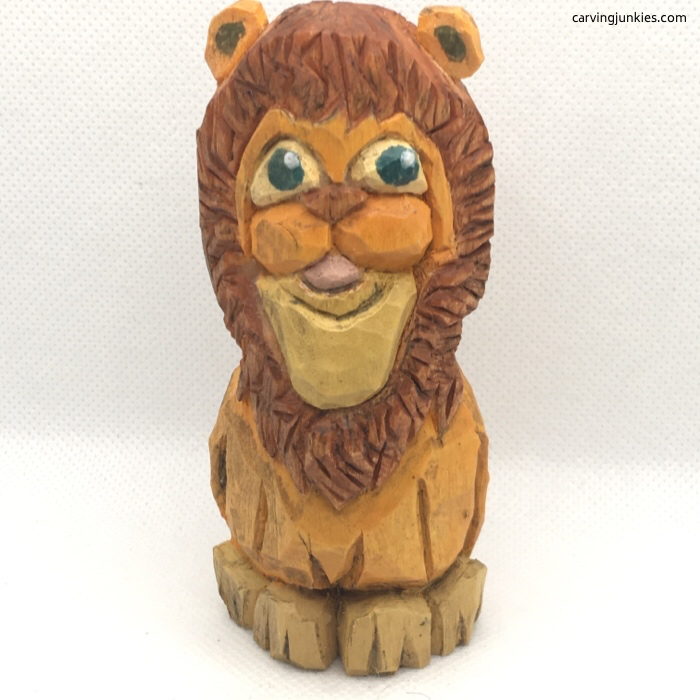 Painted lion wood carving