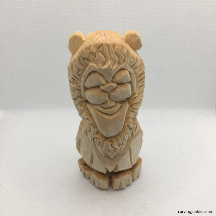 Front of lion wood carving prior to painting