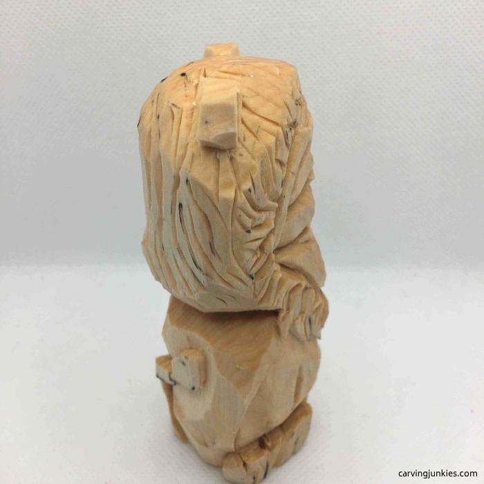 Right view of lion wood carving before painting