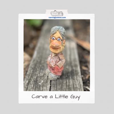 Polaroid of little guy wood carving