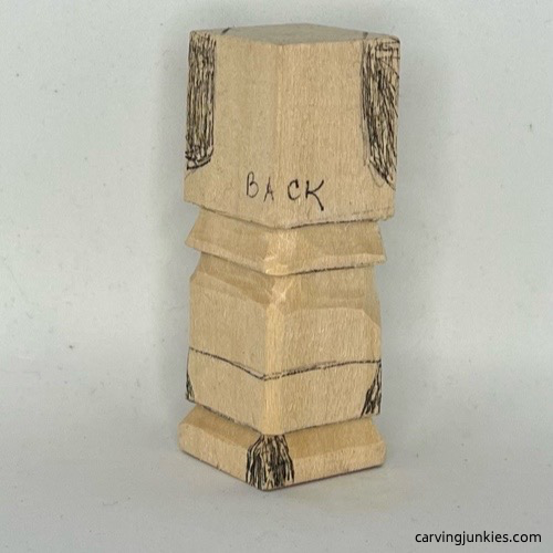 Back details on little wood carving