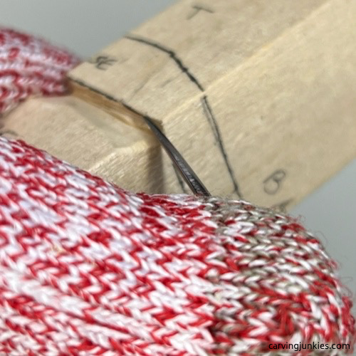 Second stop cut of little wood carving