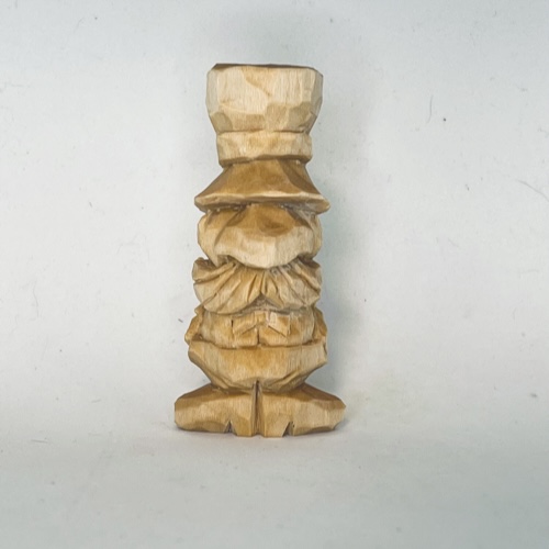 Front view of unpainted little wood carving