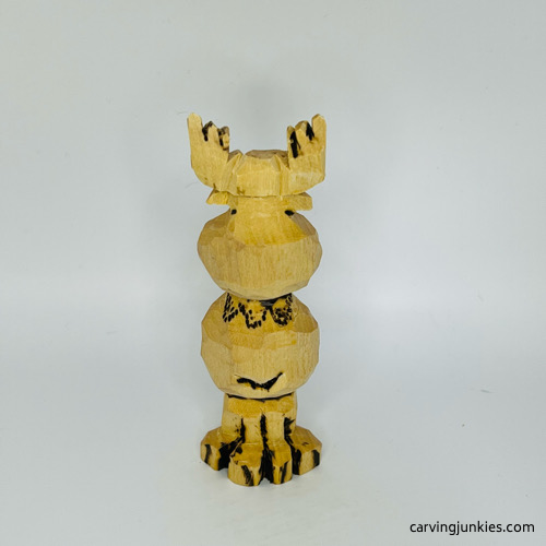 Back view of wood burned on moose carving Back side of wood burned on moose carving