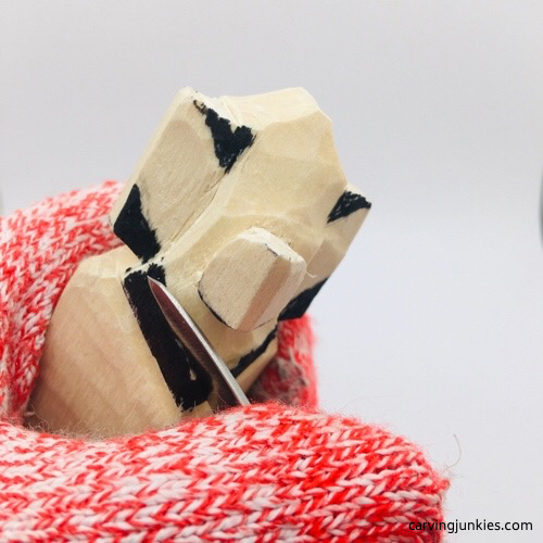 Carving neck on mouse wood carving