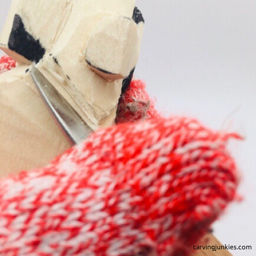 Stop cut on neck of mouse wood carving