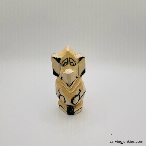 Drawn details on mouse wood carving