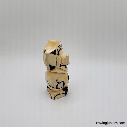 Right view of details on mouse wood carving