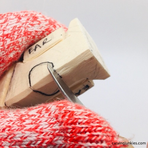 Carving nose on wooden mouse