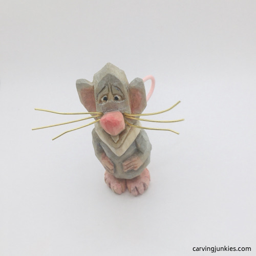 Front of painted mouse wood carving Painted mouse wood carving