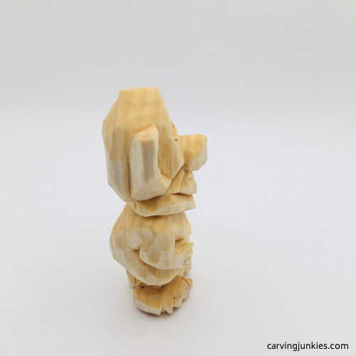 Right view of unpainted mouse wood carving