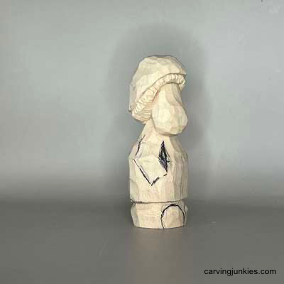 Grow something silly—carve this mushroom monster Right arm sketched on wood mushroom monster