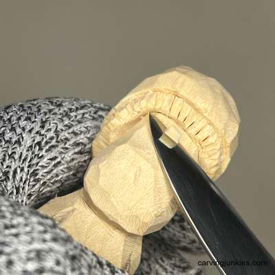 Start carving and let this cut mushroom monster grin back at you Carving eye socket for mushroom monster carving
