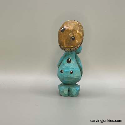 This mushroom monster is too cute not to carve Back view of painted mushroom monster