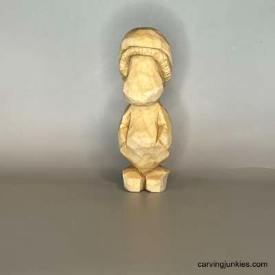 Click here to create a mushroom that’s oddly lovable Front view of unpainted mushroom monster wood carving