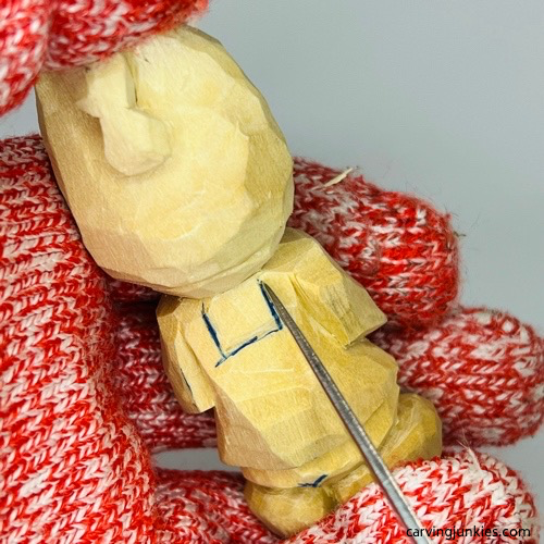 Separating apron on nisse carving