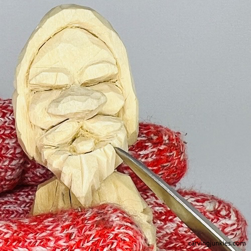 Carving beard on nisse carving