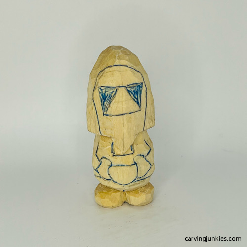 Drawn details on nisse carving