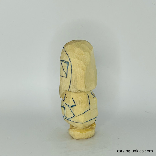 Left view of drawn details on nisse carving