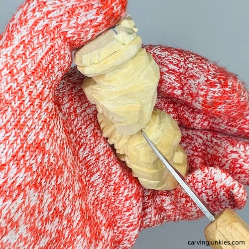 Carving back hair on nisse carving