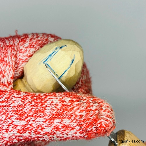 Making stop cut to nisse carving