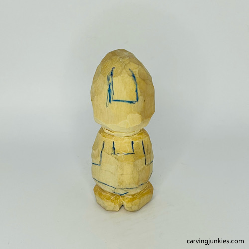 Drawn tassel on nisse carving