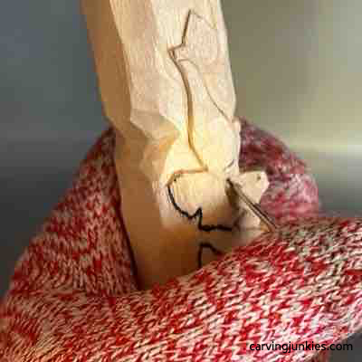 Turning nose upside down on wood green man