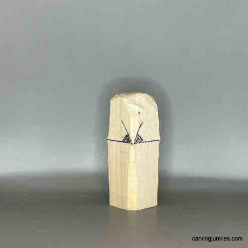 Elevate your carving skills with our wooden owl tutorial. Beak is sketched on owl carving