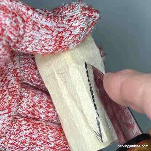 Start your woodworking journey with our owl tutorial. Separating tail on owl carving